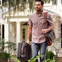 All About Tom Beckbe Canvas Wheeled Carry-On
