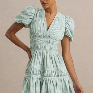 Laurelle Green Extreme Plunge-Neck Mini Dress With Ruffling Detail