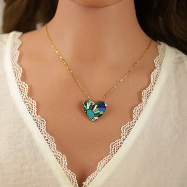 1001 Bijoux Collier Stella Mia en acier dor&eacute; pendentif Avis