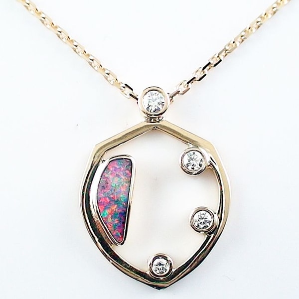 Opal-Schmiede Designerst&uuml;ck: Opalanh&auml;nger mit 2,76 ct GEM Boulder Opal und 18k Gelbgold mit 18k Goldkette Bewertung