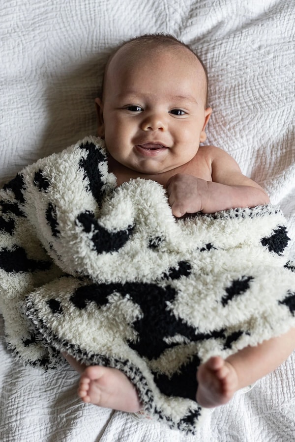 Sunset Snuggles Black & Off-White Cow Print Lovey Baby Blanket Reviews