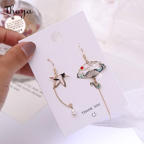 Thaya Asymmetric Crane Fan Earrings Reviews