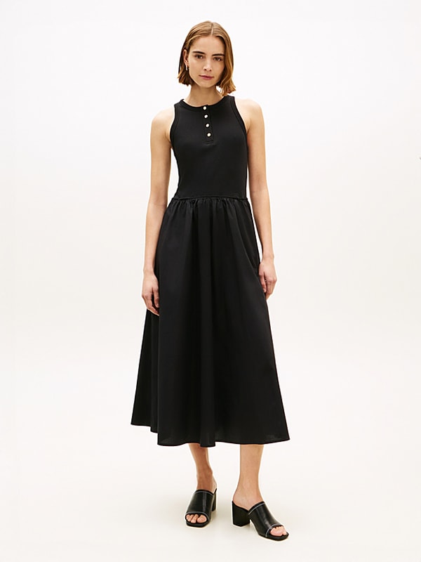 Mouwloze maxi-jurk met goudkleurige knopen Beoordeling