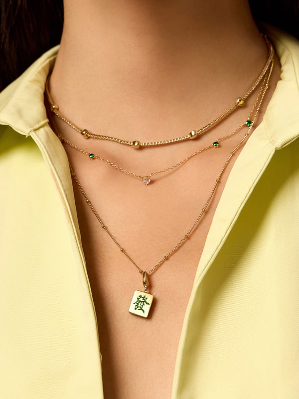 Wanderlust + Co Prosperity Mahjong Gold Charm Review