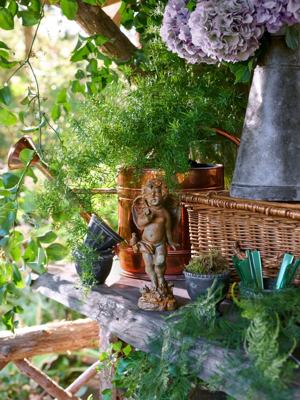 Weston Table Cherub Cast Iron Garden Statue Reviews